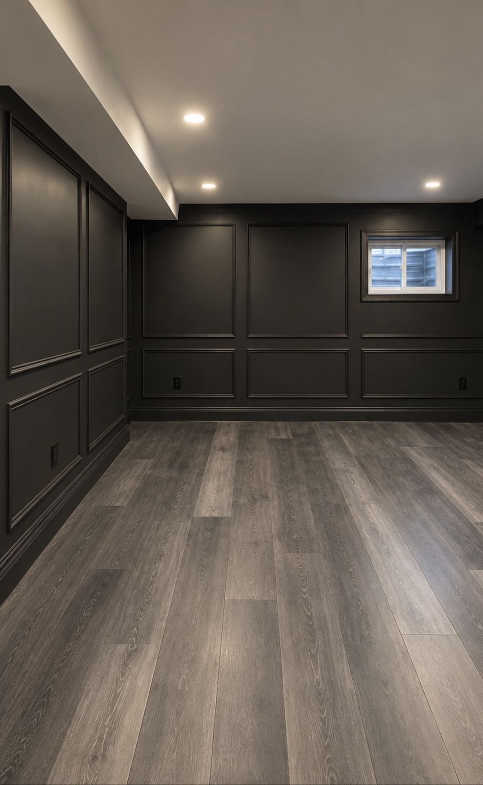 Legal basement bedroom with egress window, wainscoting and vinyl flooring by DK Construction Inc.