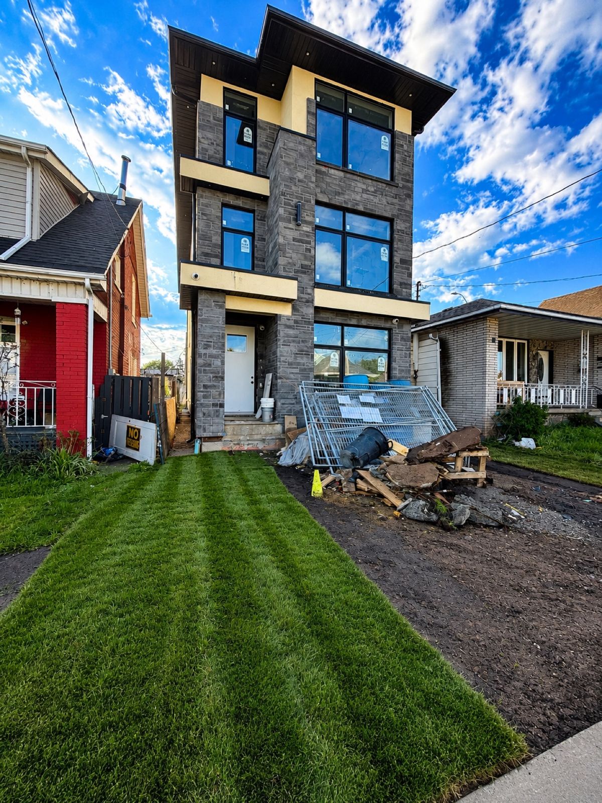 Custom built home exterior under construction by DK Construction Inc.
