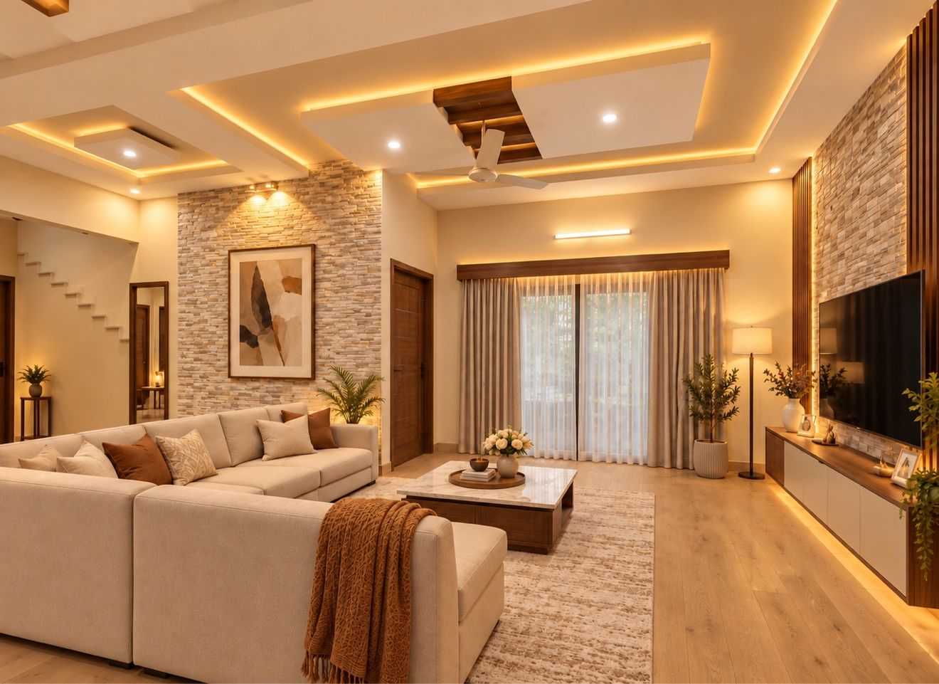 Luxury living room renovation with stone accent wall, cove lighting and TV feature wall by DK Construction Inc.